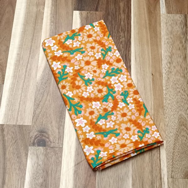 Coupon coton - Fleuri orange feuilles vertes