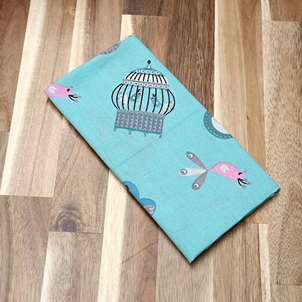 Coupon coton - Cages et oiseaux fond turquoise