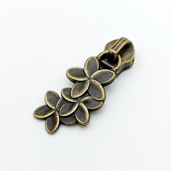 Curseur métal - Fleurs de frangipanier - Bronze