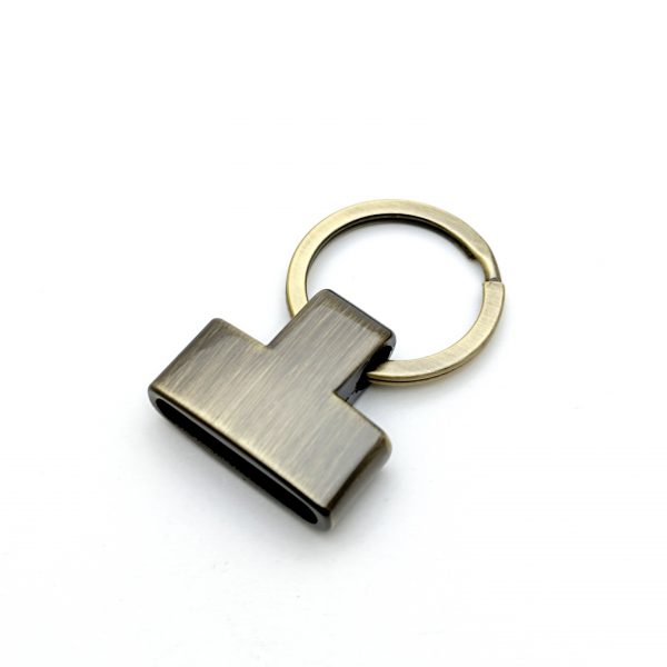 Porte clé pompon - Bronze